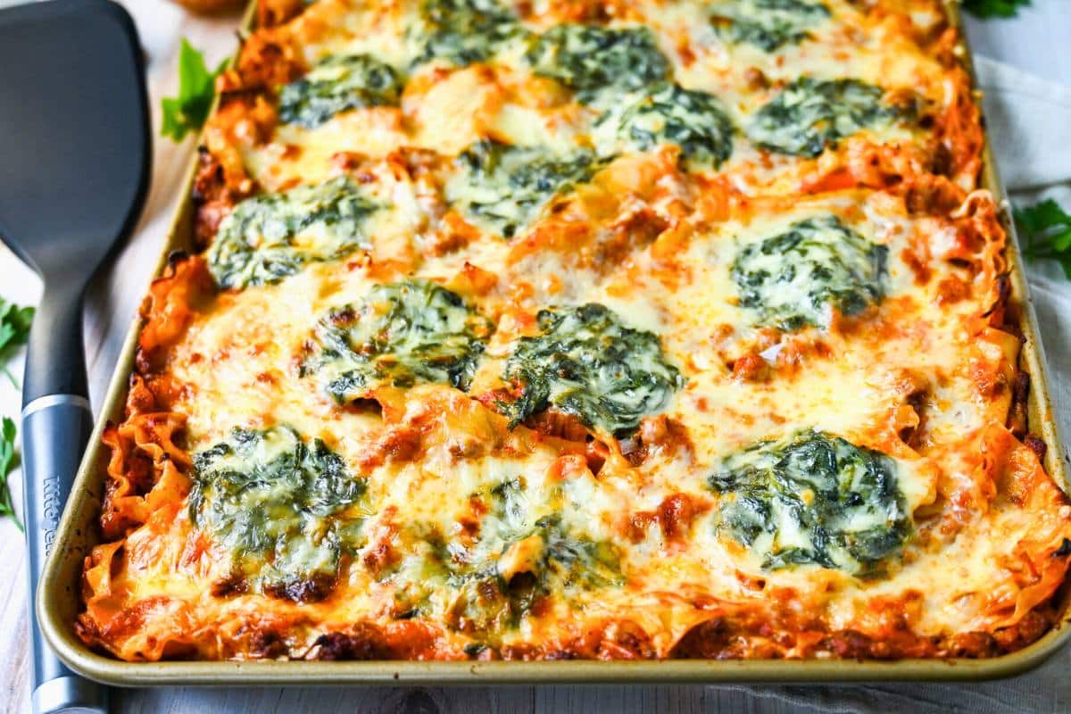 baked sheet pan lasagna ready to serve