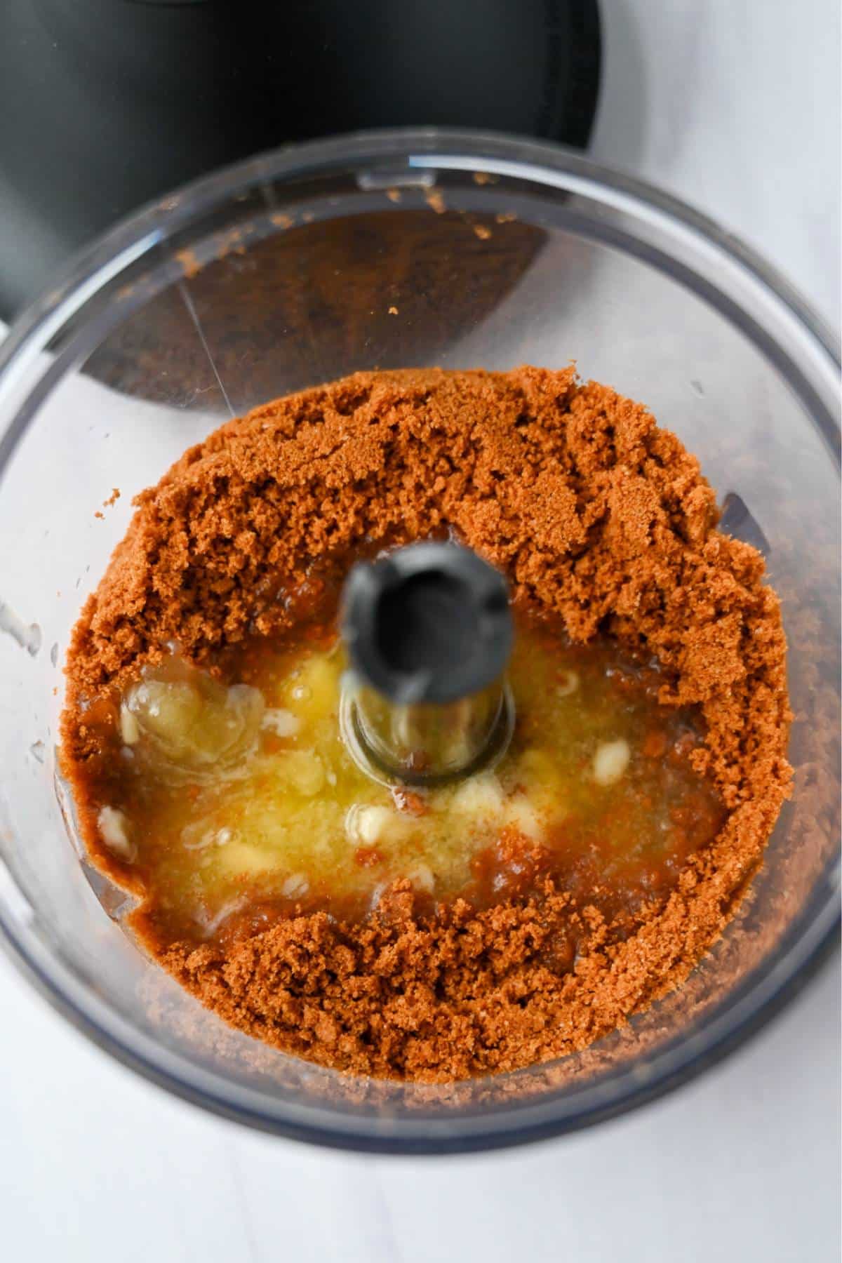 butter mixed with crushed biscoff cookies