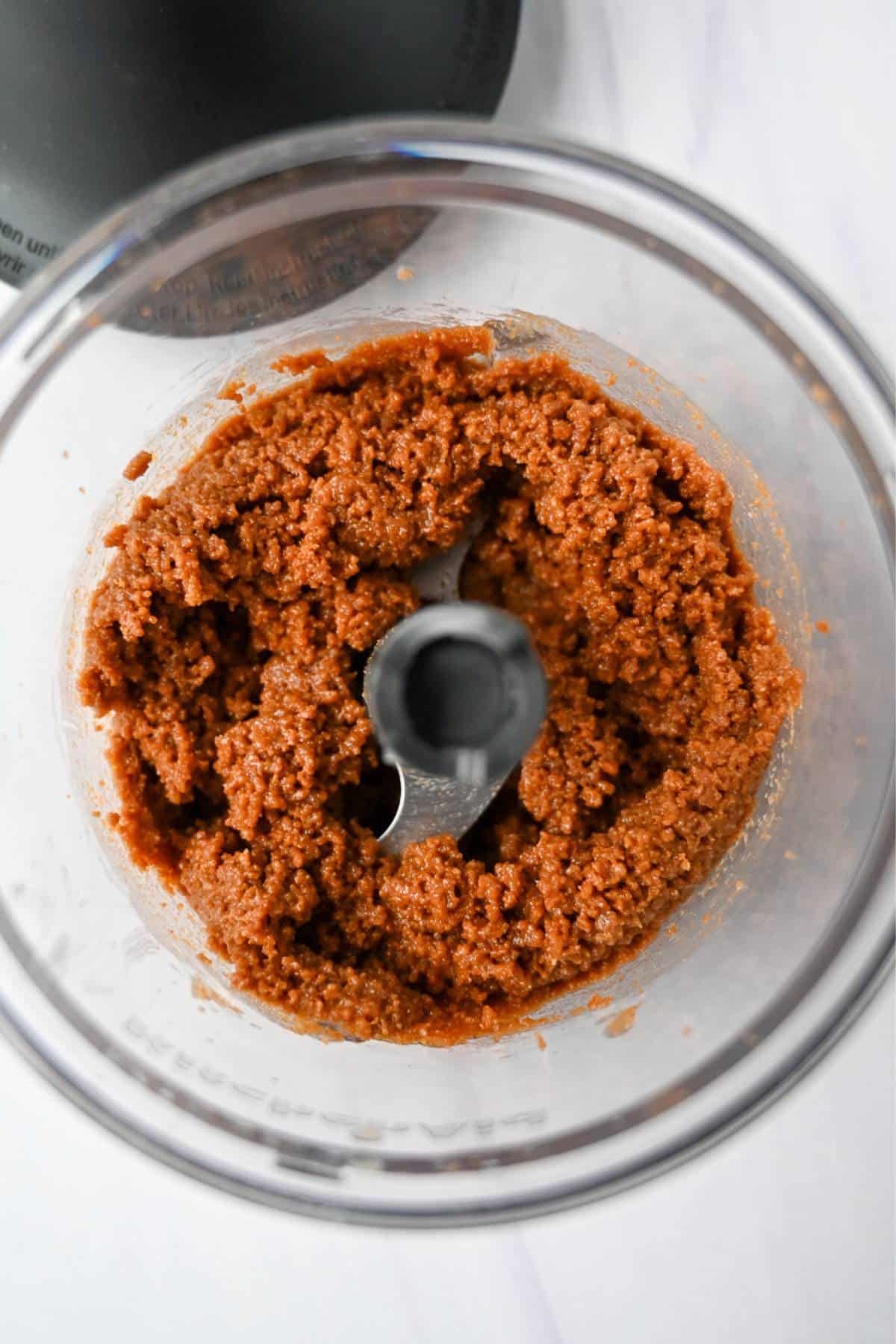 cheesecake crust made with biscoff and butter in a mini food processor