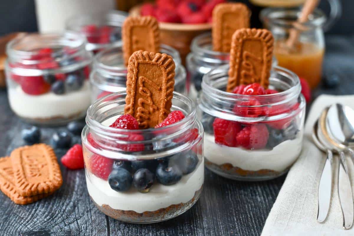 mini cheesecakes with cookies, berries, and Biscoff cookies