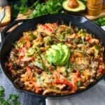 a fajita skillet with avocado
